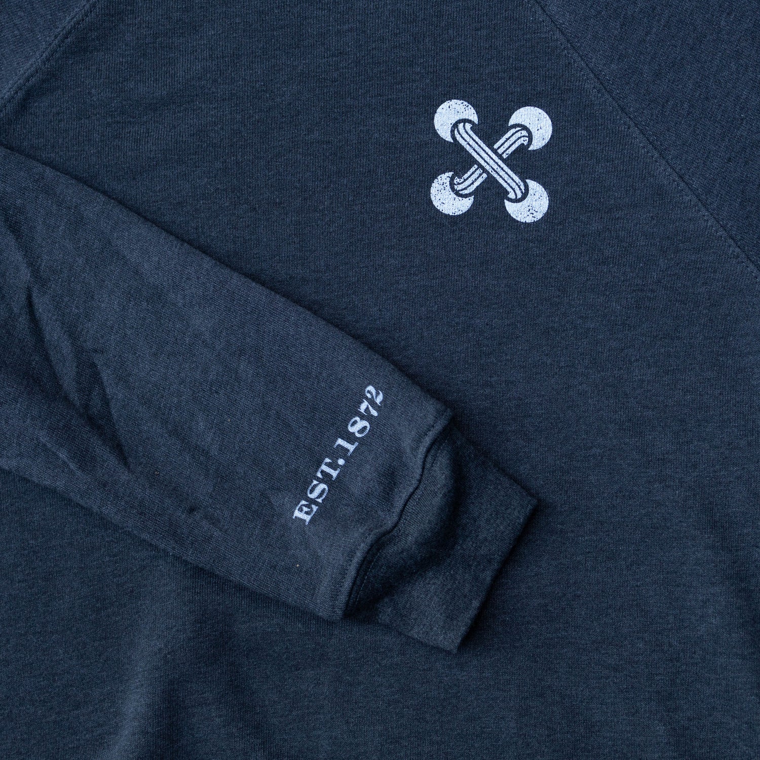 Stay warm in timeless style with this ultra-soft crewneck from Boston Button Factory