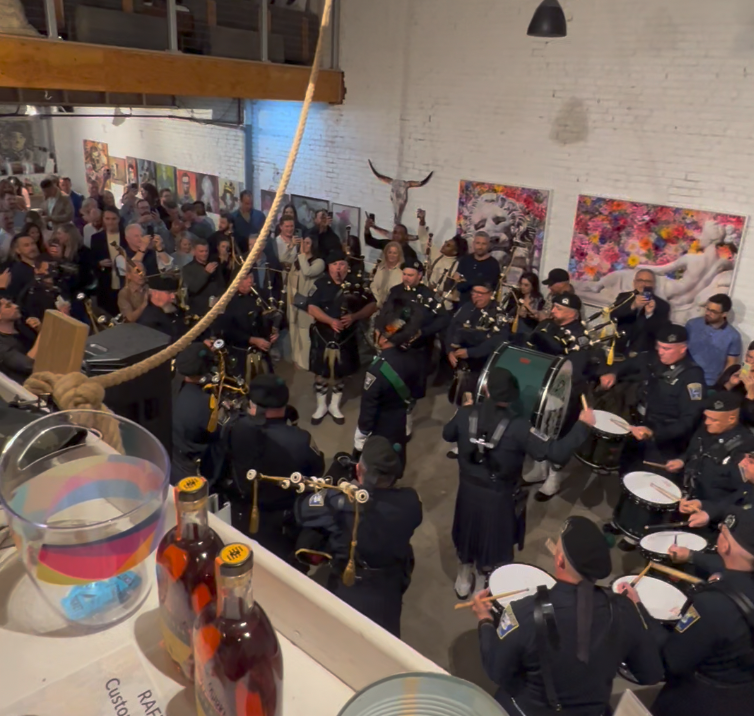 The Boston Police Gaelic Column of Pipes and Drums performance at the Boston Button Factory